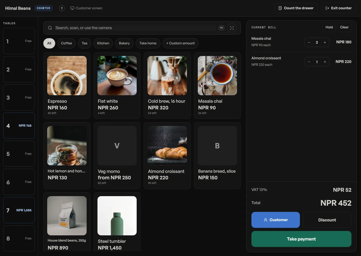 The counter: product tiles with photographs, a bill of two masala chai and an almond croissant, VAT 13 percent, a total of NPR 452, and Take payment