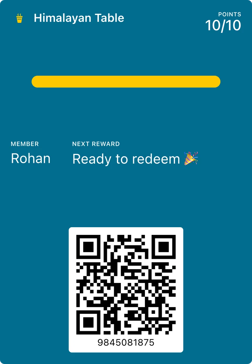 A loyalty card for a shop called Himalayan Table, showing ten points out of ten, a member name and a reward ready to redeem.